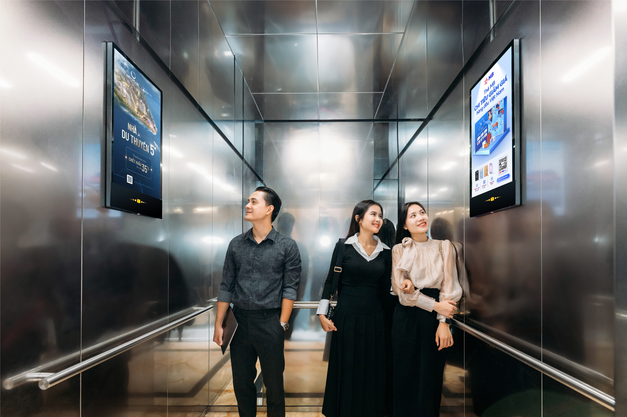 A digital screen installed inside an elevator cabin